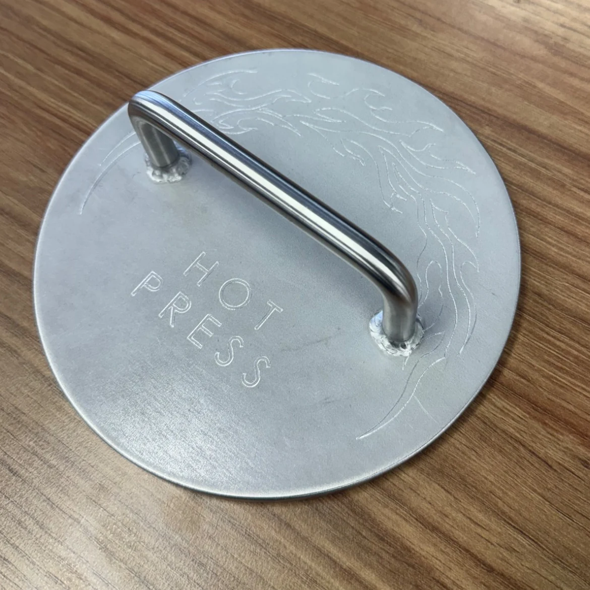 Actual Hot Press on a timber table